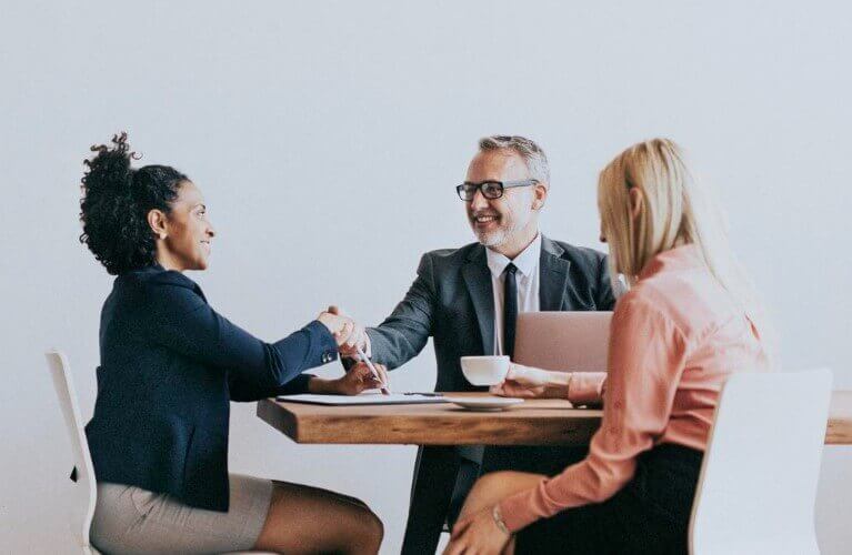 group-of-people-sat-down-meeting